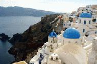 The village of Oia hangs over the Santorini caldera